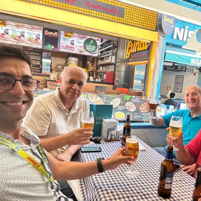 Sharing a beer with the group in Kadıköy, Istanbul