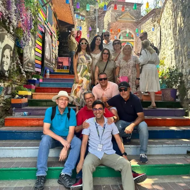A tour group on the colourful steps in Balat, Istanbul