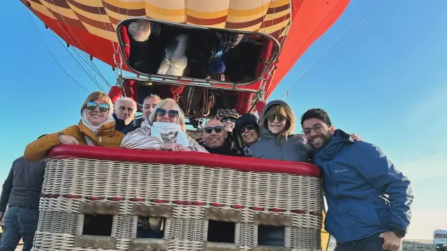 In the basket just before a hot-air balloon flight